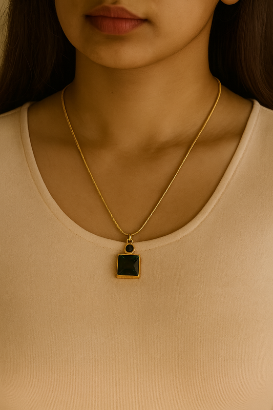 Emerald Poise Pendant